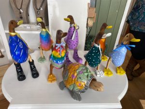 Painting days out and things to do in Exmouth, painted wooden items, turtle and lots of painted wooden ducks