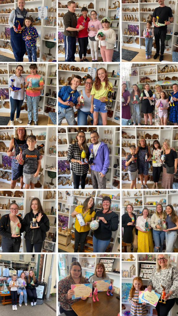 Happy customers showing what they made during pottery painting, decoupage, wood painting and afternoon teas