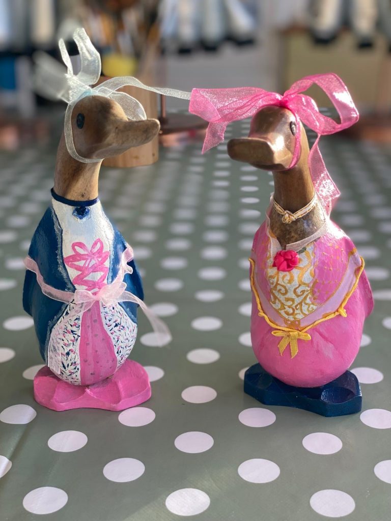 wooden ducks painted as princesses at arty boat exmouth