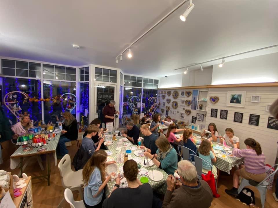 a busy session of pottery painting and wooden duck painting at arty boat exmouth