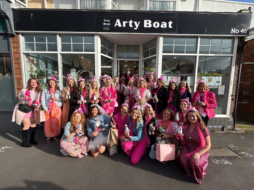 hen party at arty boat exmouth, a groupl of ladies celebrating all wearing pink 