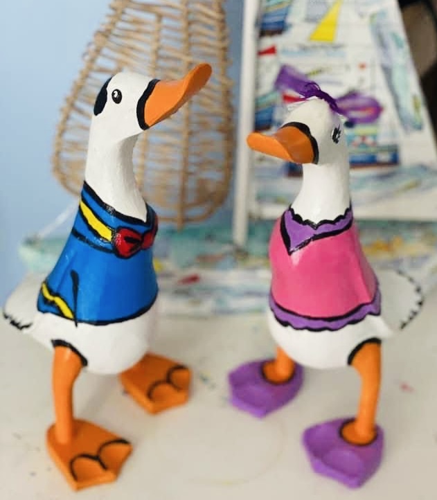 Wooden ducks painted at arty boat Exmouth, perfect activity if looking for things to do