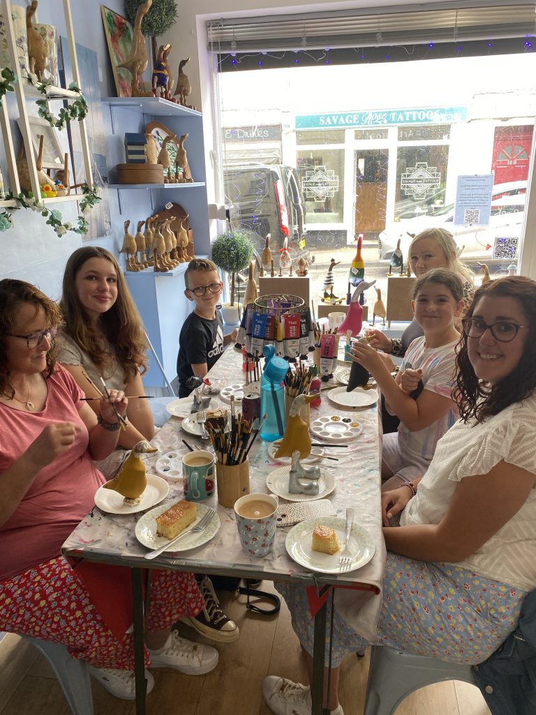 Sip & paint Exmouth, customers enjoying pottery painting and BYOB event