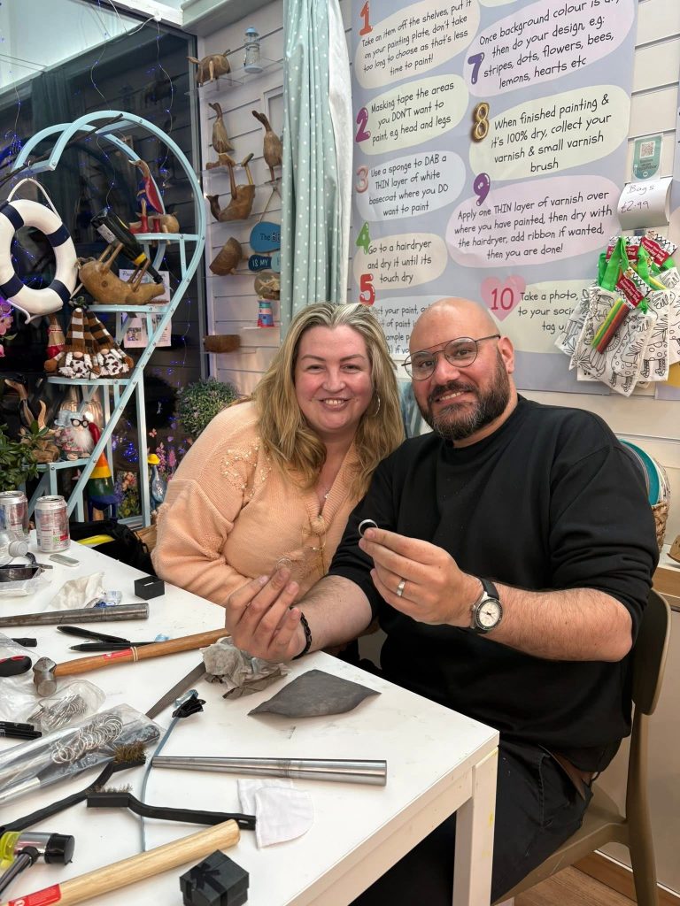 jewellery workshop exmouth, 2 smiling customers wearing the rings they made