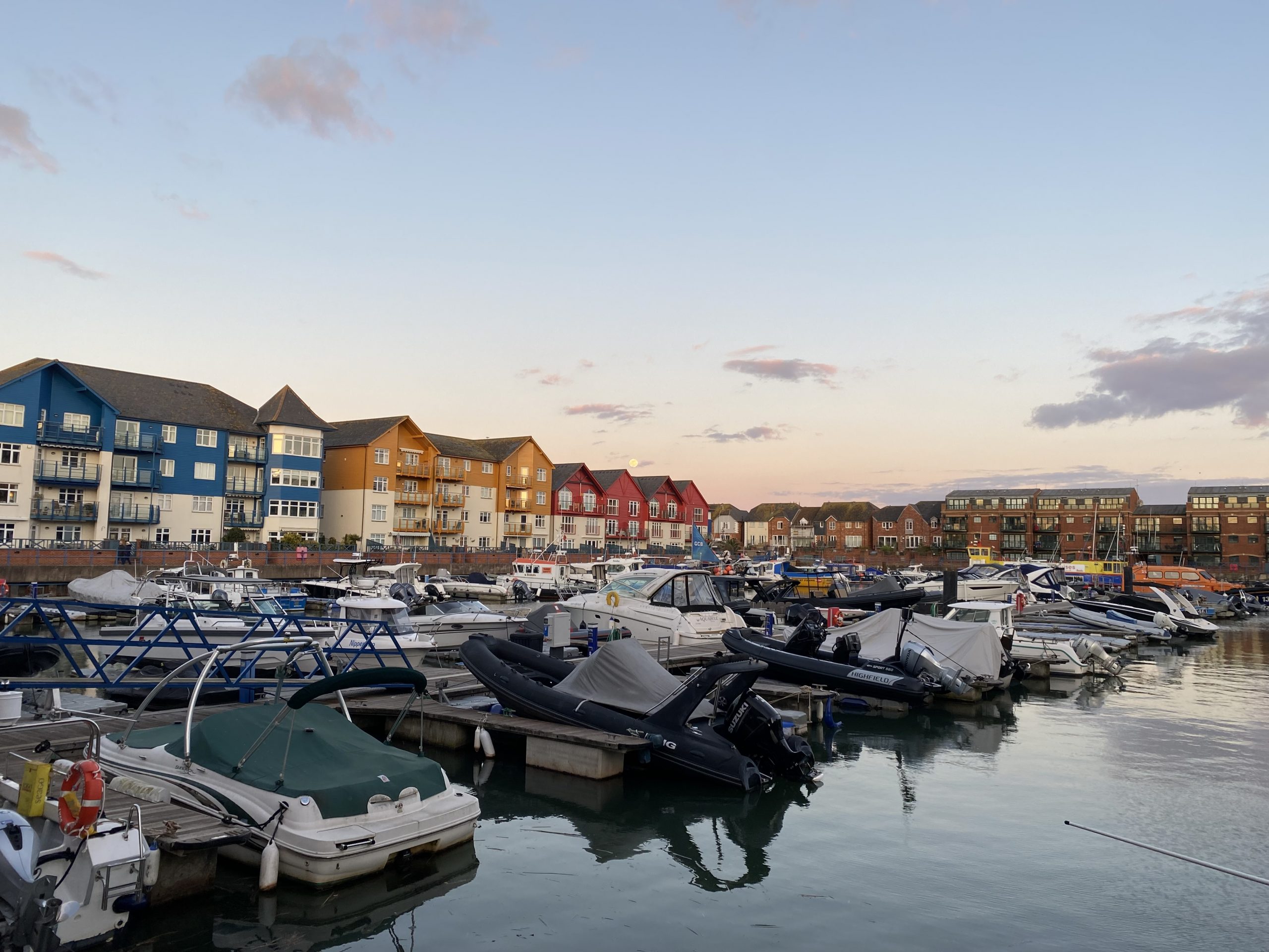 Exmouth Marina with boats and colourful waterfront buildings