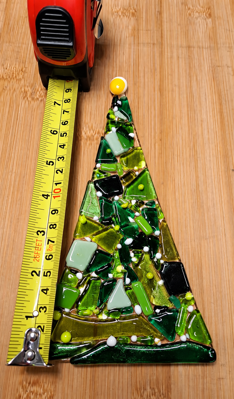 Seven inch fused glass Christmas tree showing approximate size