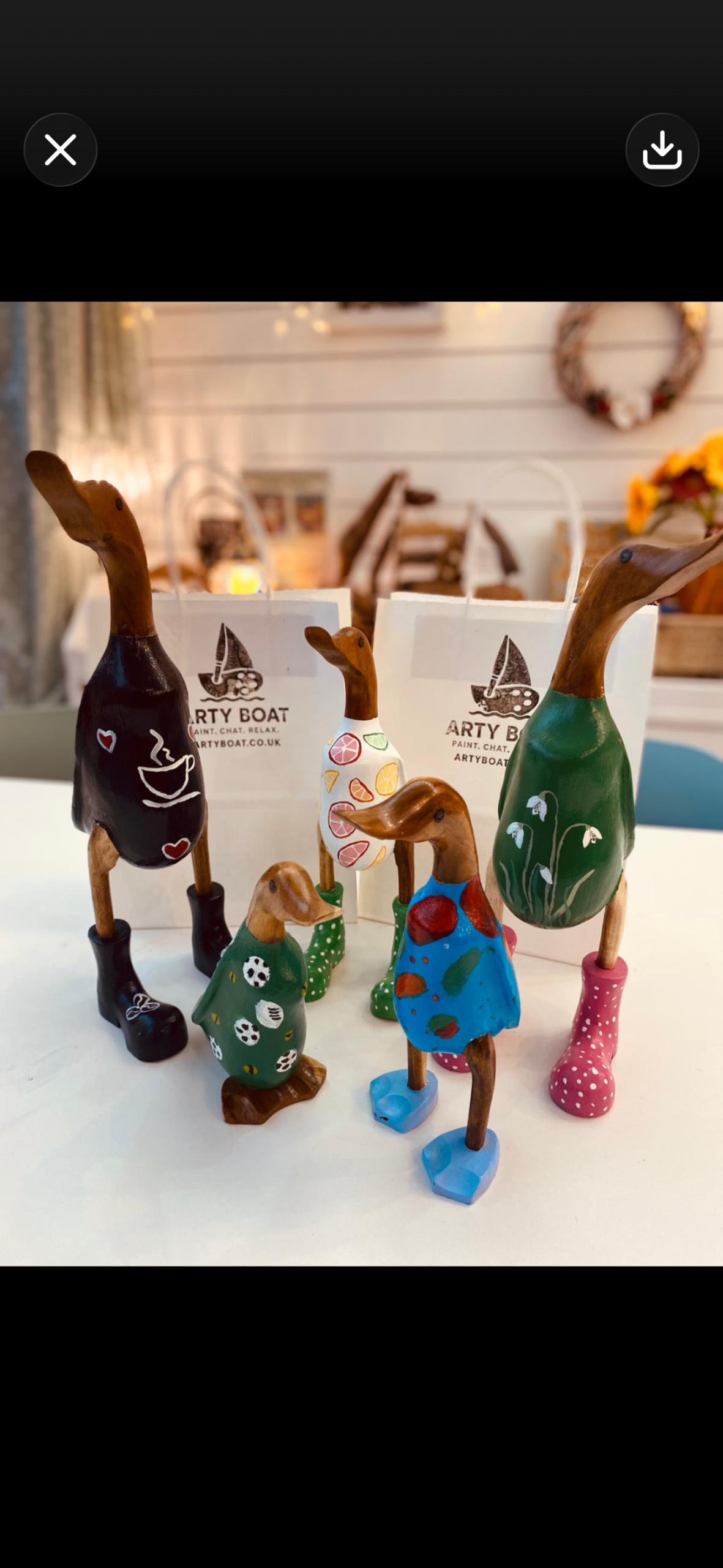 Hand painted wooden ducks at Arty Boat Exmouth Devon