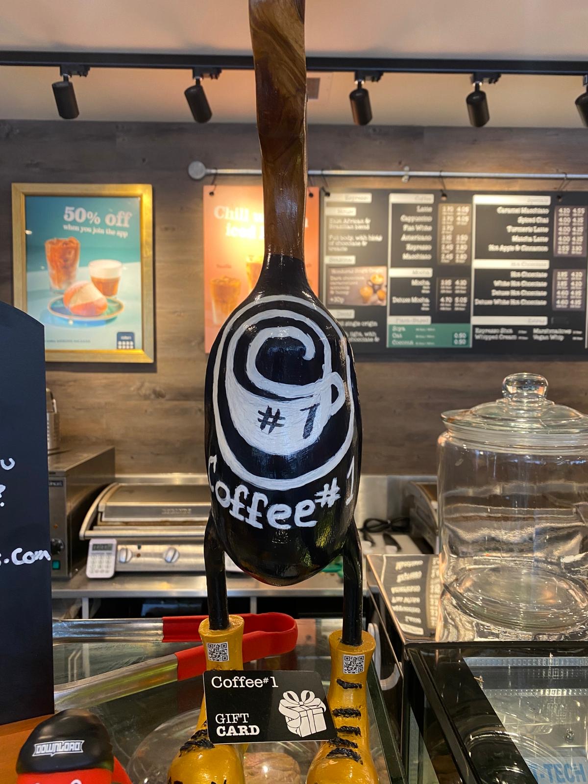 Coffee Number One branded wooden duck created by Arty Boat