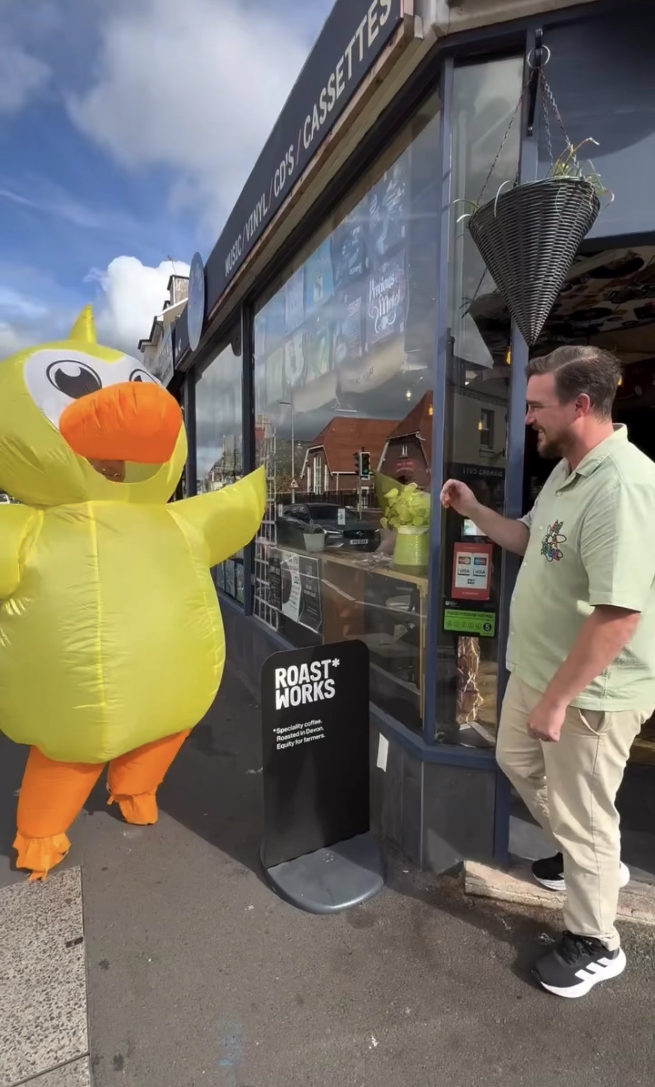 Arty Duck, the giant yellow mascot from Arty Boat in Exmouth