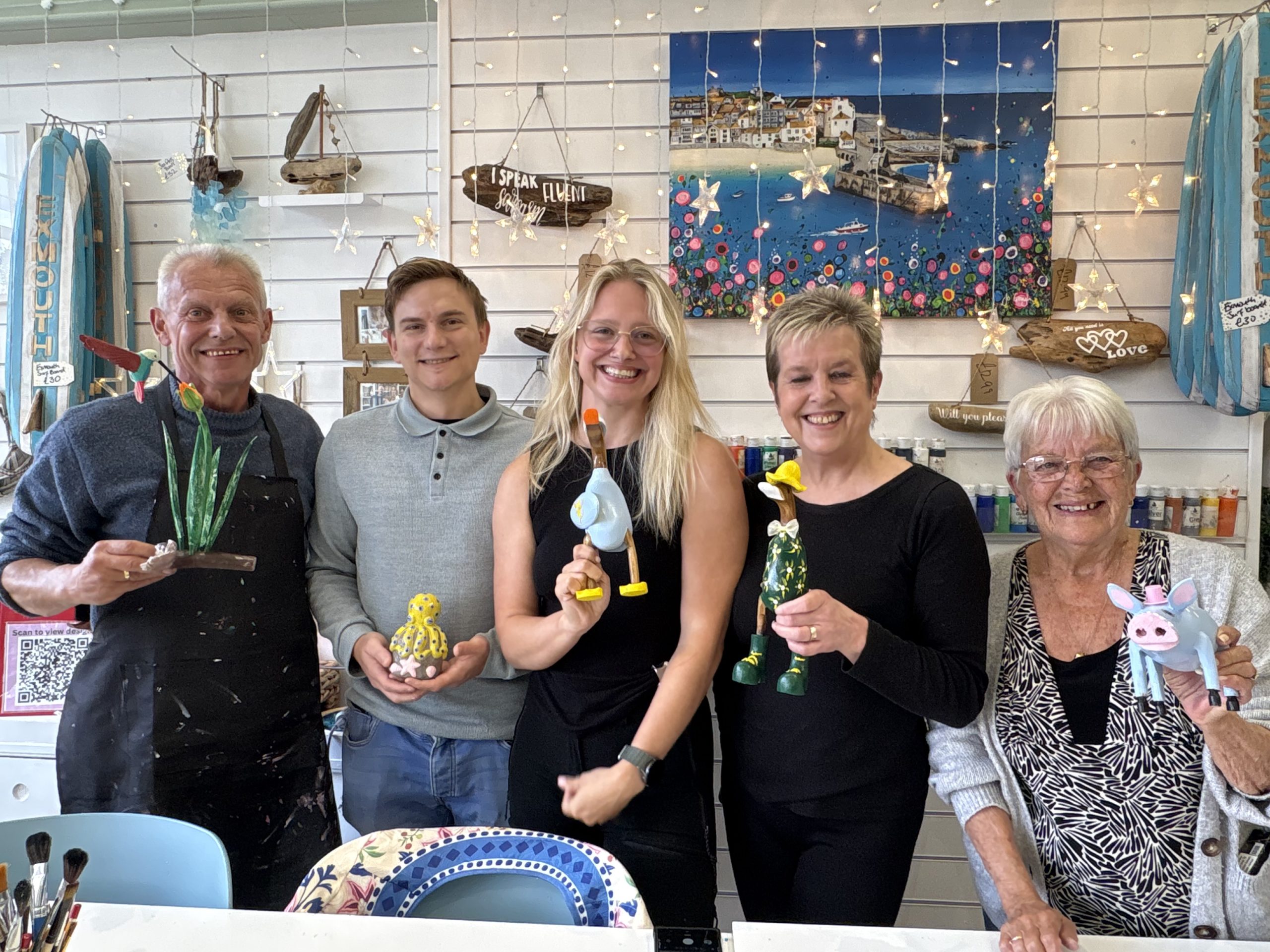 Group enjoying a creative painting activity in Exmouth